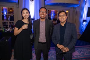 Guests gather and celebrate at the Central City Association’s holiday party, socializing in a festive indoor setting with warm lighting and seasonal décor.